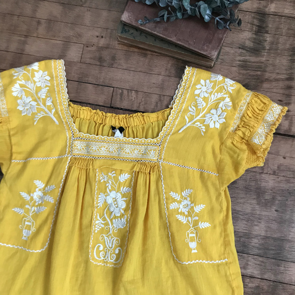 yellow embroidered blouse